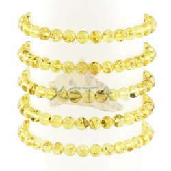 Yellow green round amber bracelet